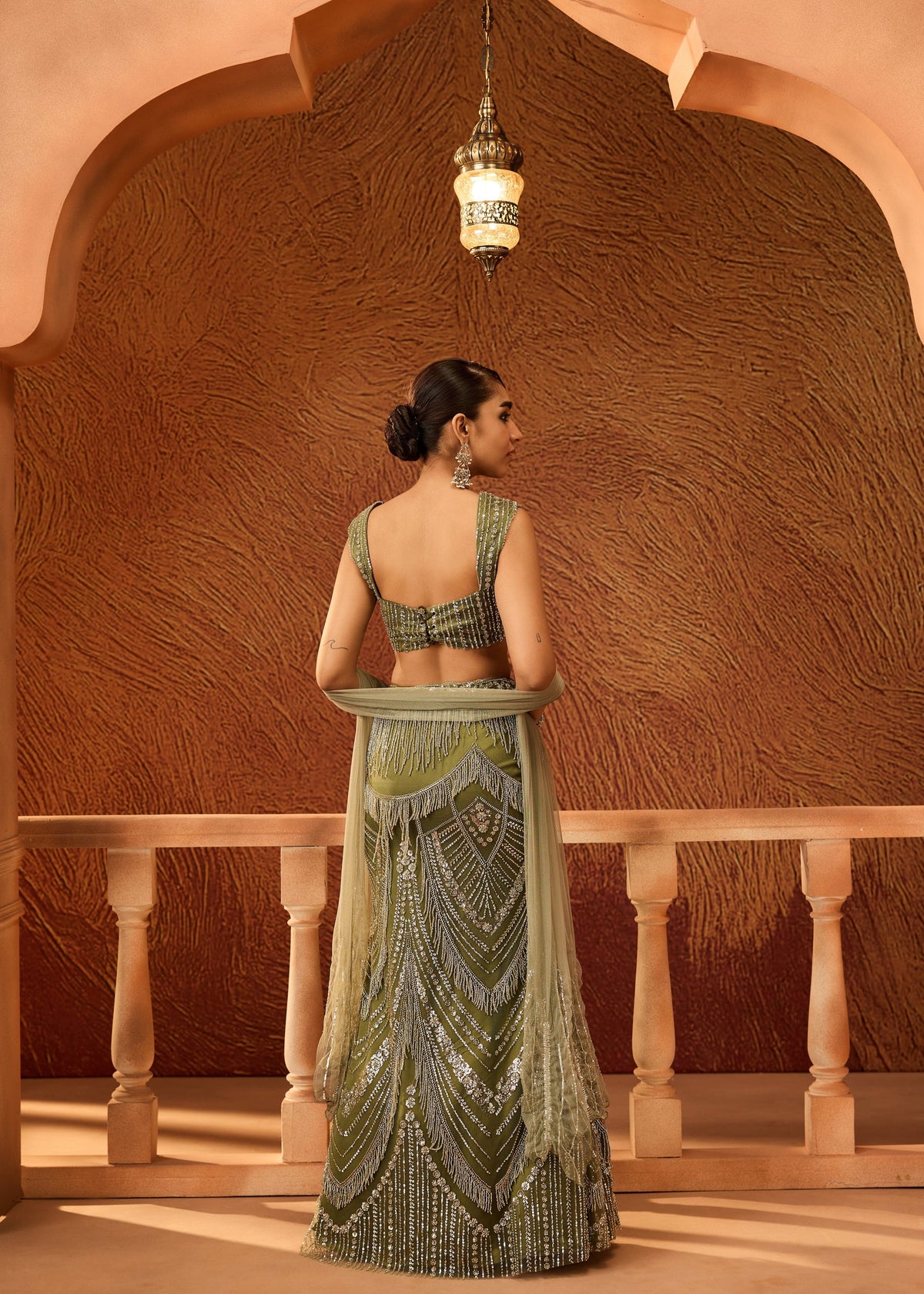 Zeenat Dark Green Heavy Embellished Lehenga