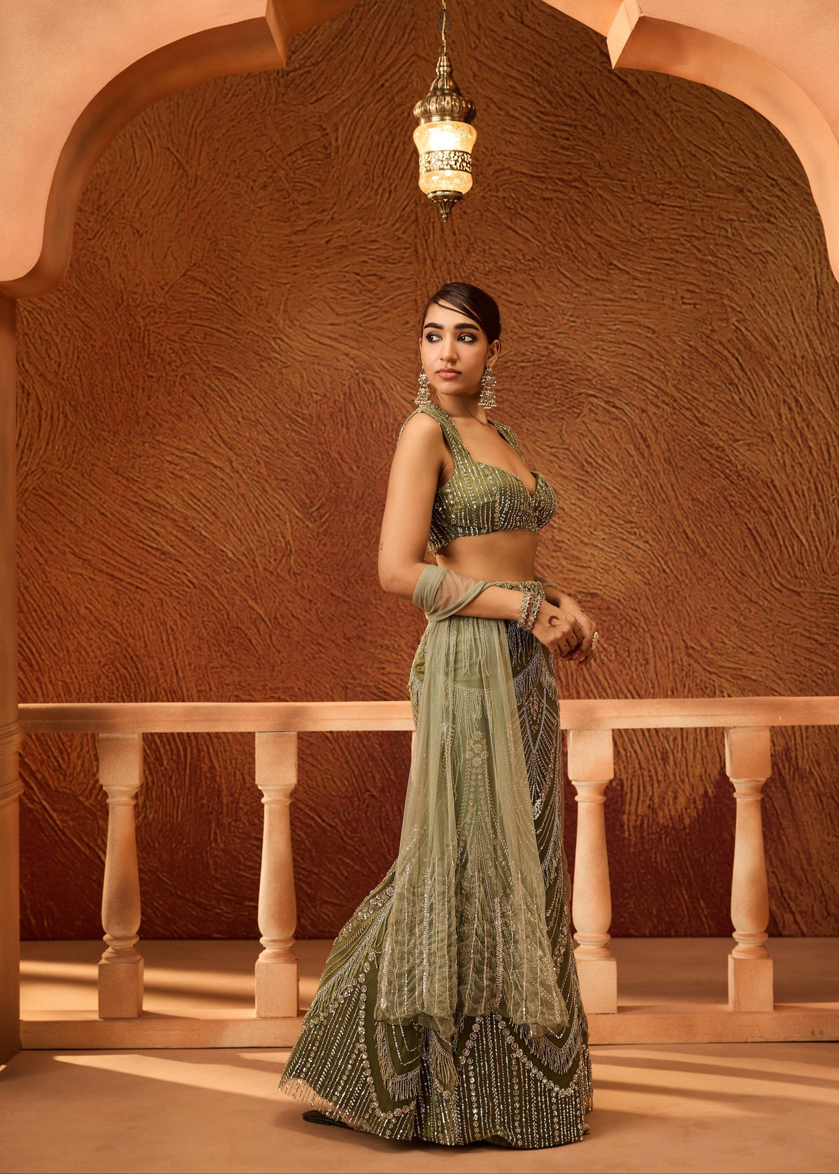 Zeenat Dark Green Heavy Embellished Lehenga