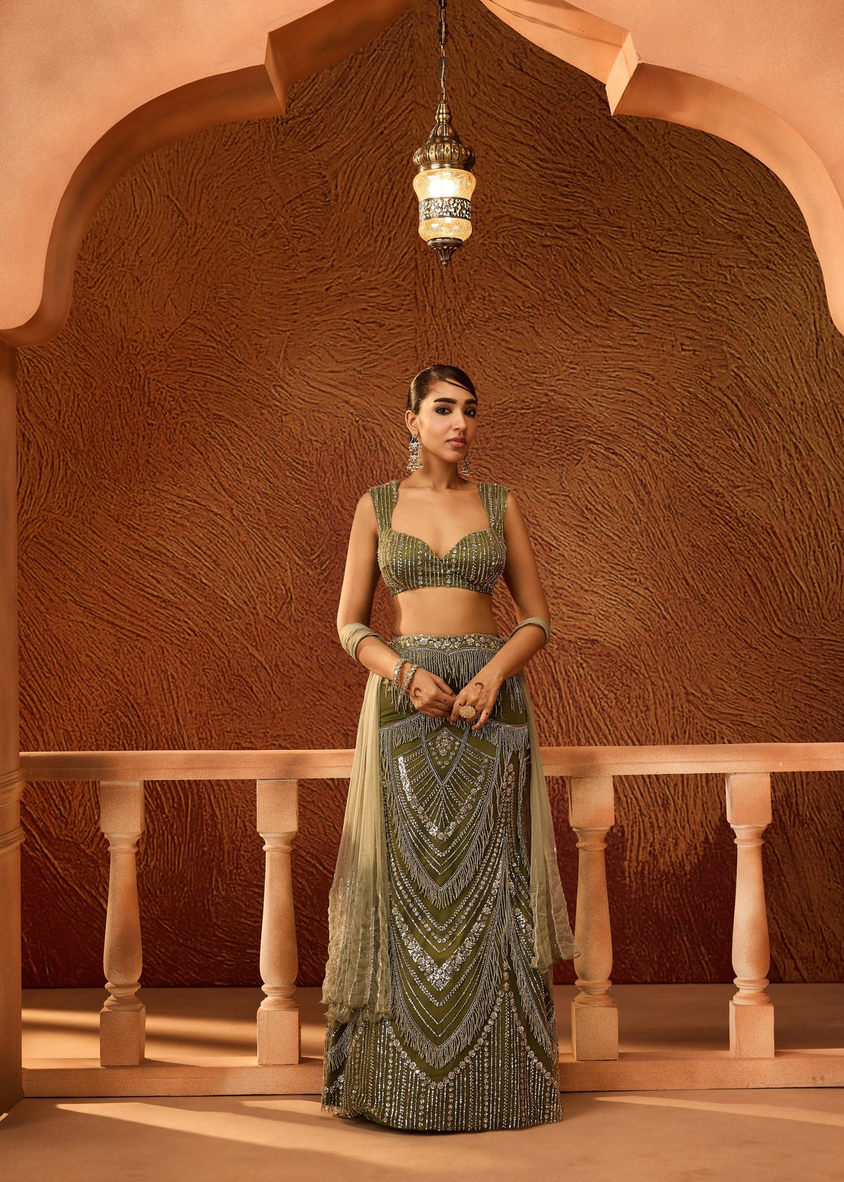 Zeenat Dark Green Heavy Embellished Lehenga